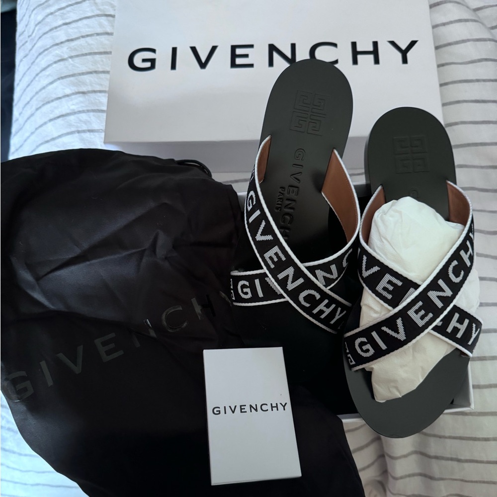 Black leather sandals by Givenchy.